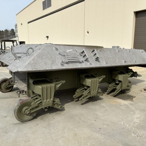 Sandblasting complete on hull of M36 Jackson, road wheel suspension repainted and being reassembled.