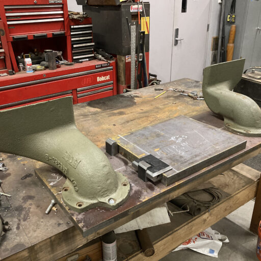 Exhaust components repainted and ready for reinstallation on the M36 Jackson.