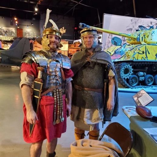 Re-enactors in historic Roman and medieval armor at the museum